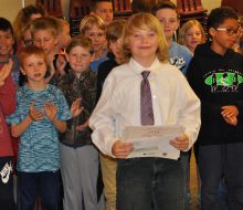 Highlander J. Sweet-Jenema and classmates