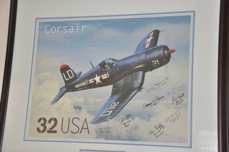 A commemorative stamp of the Corsair, the plane Winnell flew in WWII, was issued by the U.S. Post Office a few years ago. Winnell has this enlarged version framed in his living room.